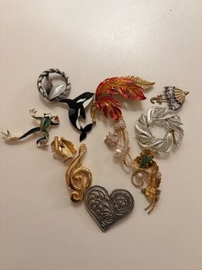 Vintage gold tone an colorful Brooches